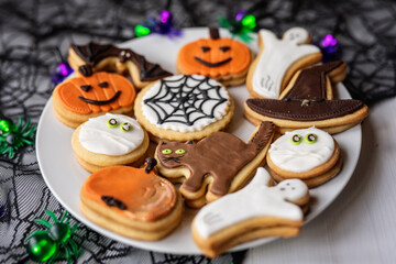 halloween dessert sweet baked trick or treat cookies, cake, bisquits shaped pumpkin, ghost, with,  - 541069353