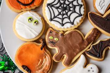 halloween dessert sweet baked trick or treat cookies, cake, bisquits shaped pumpkin, ghost, with,  - 541072512