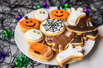 halloween dessert sweet baked trick or treat cookies, cake, bisquits shaped pumpkin, ghost, with,  - 541072764