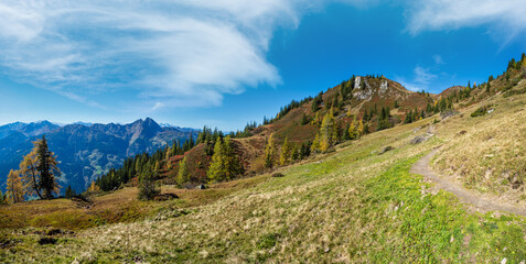 Fototapeta premium Peaceful autumn Alps mountain sunny view from hiking path from Dorfgastein to Paarseen lakes, Land Salzburg, Austria.