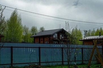 village houses behind the fence
