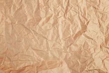 Background from crumpled craft paper for packaging.