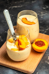 yogurt peaches breakfast drink, fresh blended peach smoothie, vertical image place for text