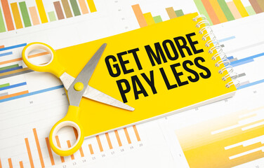 Get more pay less text on yellow notebook and charts