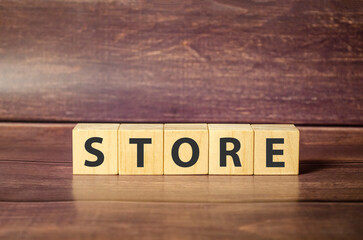 store word on wooden blocks and wooden background