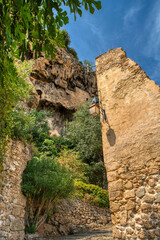 Travel destination, small old village in hear of Provence Cotignac with famous cliffs with cave dwellings and troglodytes houses, Var, Provence Alpes Cote D'Azur, France