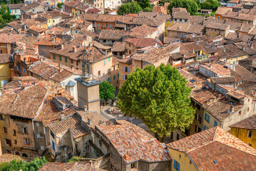 Travel destination, small old village in hear of Provence Cotignac with famous cliffs with cave dwellings and troglodytes houses, Var, Provence Alpes Cote D'Azur, France