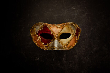 Vibrant VenetianVmask on dark background. Carnival mask.