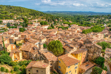 Travel destination, small old village in hear of Provence Cotignac with famous cliffs with cave...