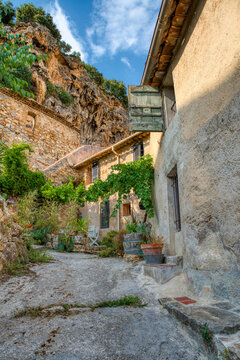 Travel destination, small old village in hear of Provence Cotignac with famous cliffs with cave dwellings and troglodytes houses, Var, Provence Alpes Cote D'Azur, France