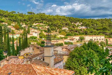 Travel destination, small old village in hear of Provence Cotignac with famous cliffs with cave...