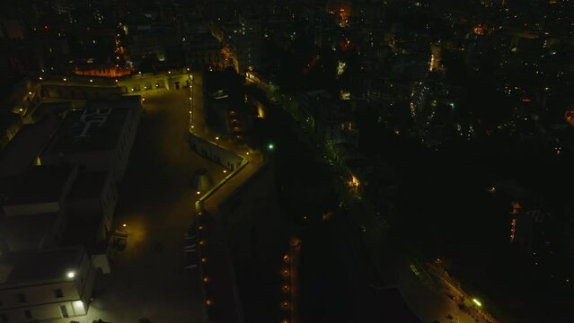 Aerial View Of Illuminated Medieval Fortified Castle In Star Shape. Castel SantElmo At Night. Naples, Italy