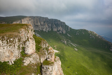 Fototapeta na wymiar Sheer rock at the top of the mountain