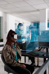 African american programmer writing code and using holographic program with augmented reality,...