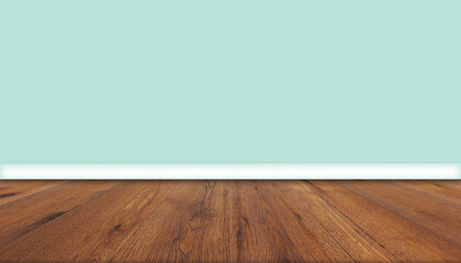 Fototapeta na wymiar Mock-up image of dark grained hardwood floor panels leading towards a plain blue-green heather traditional painted wall in the background.