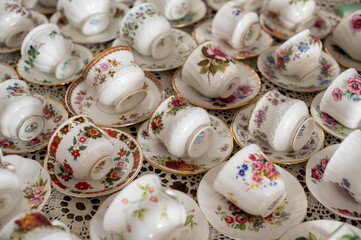 colored cup and saucer, lots of beautiful coffee or tea cups.