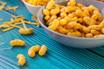 Beer salty snacks on wooden table