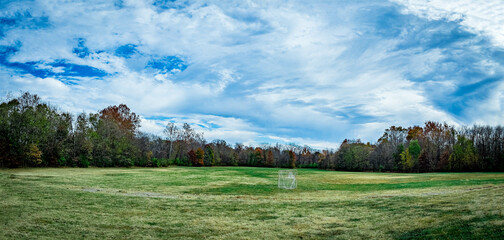 Autumn lawn on the grounds of Veteran's park in Lexington, Kentucky with lacrosse goal in the middle