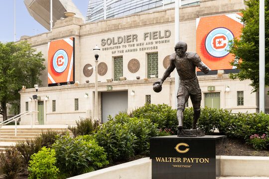 CHICAGO, IL, USA - JULY 1 , 2022: Soldier Field is home to the Chicago Bears and owned by the Chicago Park District. The stadium can hold 61,500 people for sports, concerts, and other events.	
