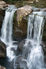 Obraz premium Fairy Pools waterfalls,water cascading from pools,Isle of Skye,highlands of Scotland ,UK.