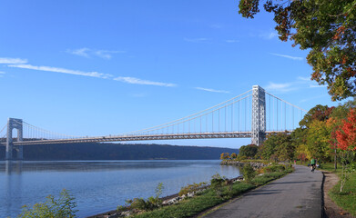 Manhattan bike trail along the Hudson River, approaching the George Washington Bridge