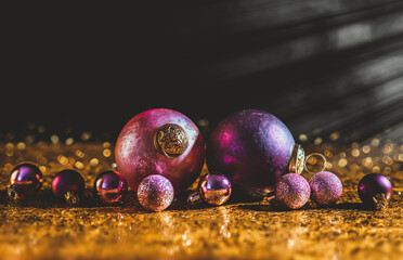 Merry Christmas and Happy New Year! Christmas toys on a gold and black background