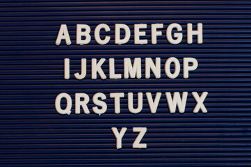 Pushboard sign that with English alphabet in plastic letters