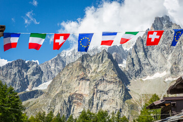 European flags along tour du Mont Blanc, French Alps, near Switzerland and Italy - obrazy, fototapety, plakaty