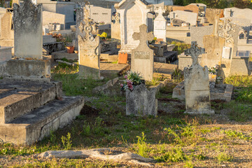In a cemetery, view of old tombstones