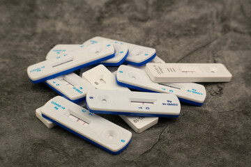 used covid 19 corona rapid tests for home and private use with first positive then negative results