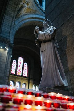 Vertical Shot Of Margaret Mary Alacoque Statue In The Basilica Of The Sacred Heart Of Paris