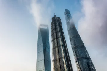 Fotobehang Shanghai, China - Dec. 12, 2020: Shanghai tower, Jin mao tower and Shanghai World Financial Center, landmarks in Lujiazui, Pudong district. © evening_tao