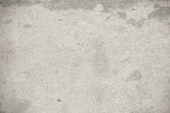 Cement sidewalk pavement Simple gray textured backround 