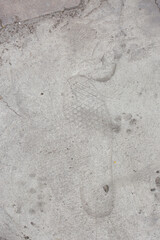 Shoe print foot print on dry cement