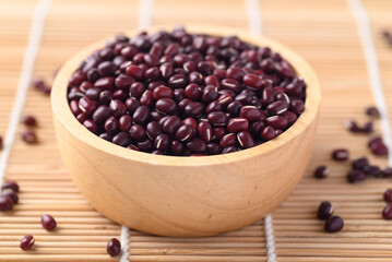 Azuki beans, Adzuki bean or red mung beans in wooden bowl, Food ingredients in many Chinese dishes and filling in Japanese sweet