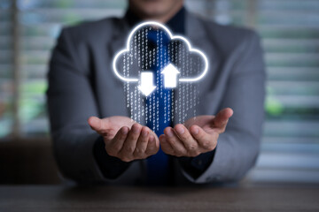 Cloud computing concept - Information technologist connect devices to cloud with cloud computing icon on hand