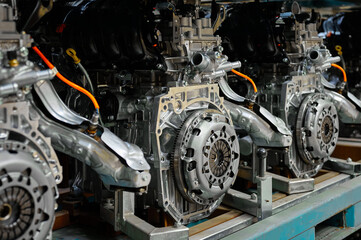 Fototapeta premium Car internal combustion engines stand on racks in warehouse