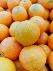 Mandarin Orange, Organic Citrus on Fruits shelf in store Farmer's Market Organic.
