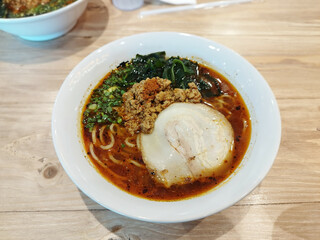 Spicy Miso Ramen with Chashu pork slide, Wakame seaweed and minced pork. Japanese food.