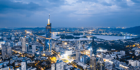 Obraz premium Aerial night view of Zifeng Tower and city skyline in Nanjing, Jiangsu, China
