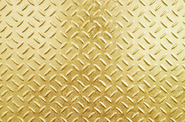 Gold metal plate with embossed pattern for anti slip. Glossy gold grunge metallic textured...