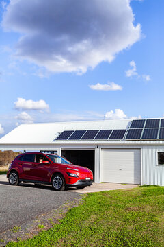 Sustainable Living Concept - Environmentally Friendly Electric Car Powered By Solar Energy