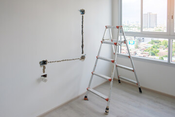 Ladder at construction site building. Renovation, Repair and development of home and apartment concepts