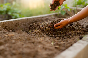 Expert farmer checking soil quality after mixed compost at garden.