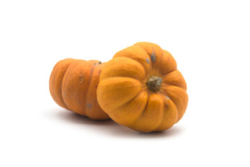 closeup of small pumpkins on white background