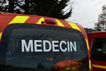 Back window of an emergency response vehicle dedicated to transport a doctor, paramedic team to the scene of accident or any environmental disaster. 