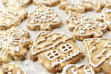 Close-up of Christmas pastries on a light background with golden snowflakes