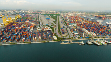 Obraz premium Shipyard Cargo Container Sea Port Freight forwarding service logistics and transportation. International Shipping Depot Custom Port for import export trade Transport Business manufacturing shipping 
