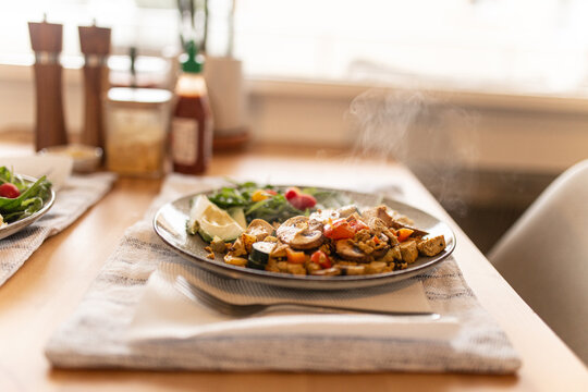 Close up shot of healthy vegetable based meal on kitchen table