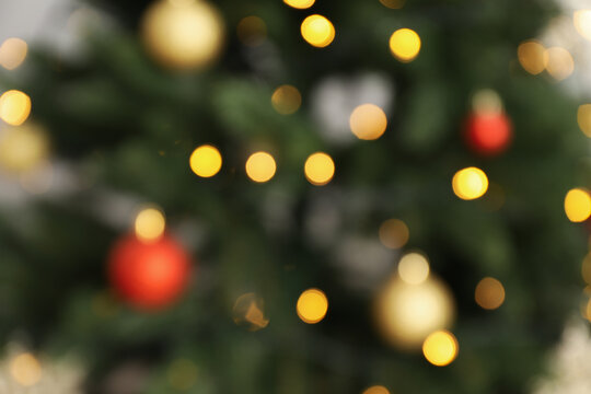 Concept of Happy New Year, Christmas tree, blurred photo